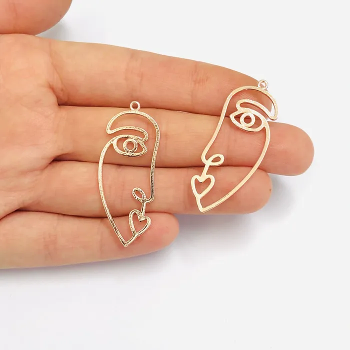 Earrings Peppy Beads Face Outline Rose Gold Plated Brass Charms Abstract Face Pendants 2 pcs in a pack Earrings Peppy Beads Face Outline Rose Gold Plated Brass Charms Abstract Face Pendants 2 pcs in a pack