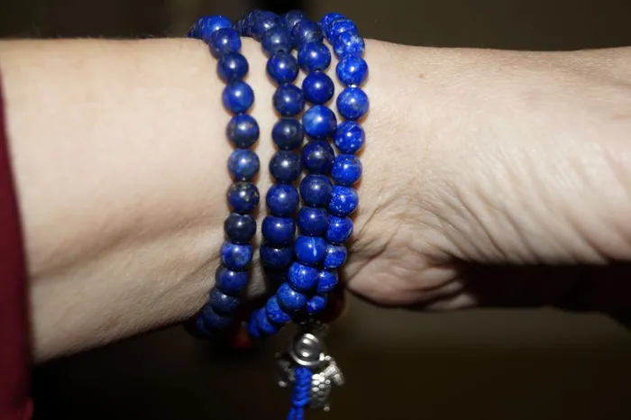 Nirvana Mala Stretchy Lapis Mala with Carnelian Markers Necklaces