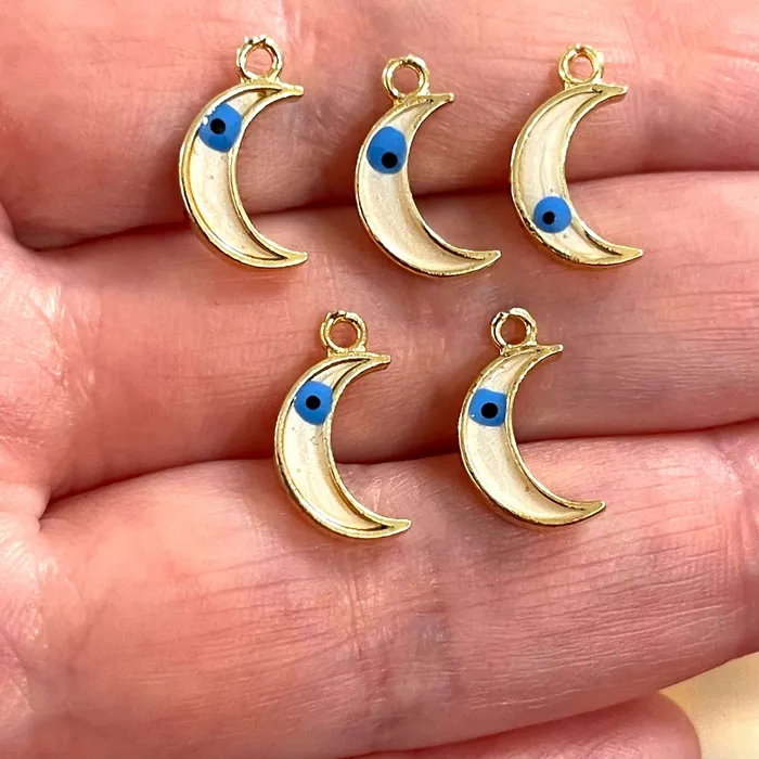 Peppy Beads Earrings 24Kt Gold Plated Brass Crescent Charms With Eye Gold Plated Ivory Crescent Enamelled Charms 5 pcs in a pack Peppy Beads Earrings 24Kt Gold Plated Brass Crescent Charms With Eye Gold Plated Ivory Crescent Enamelled Charms 5 pcs in a pack