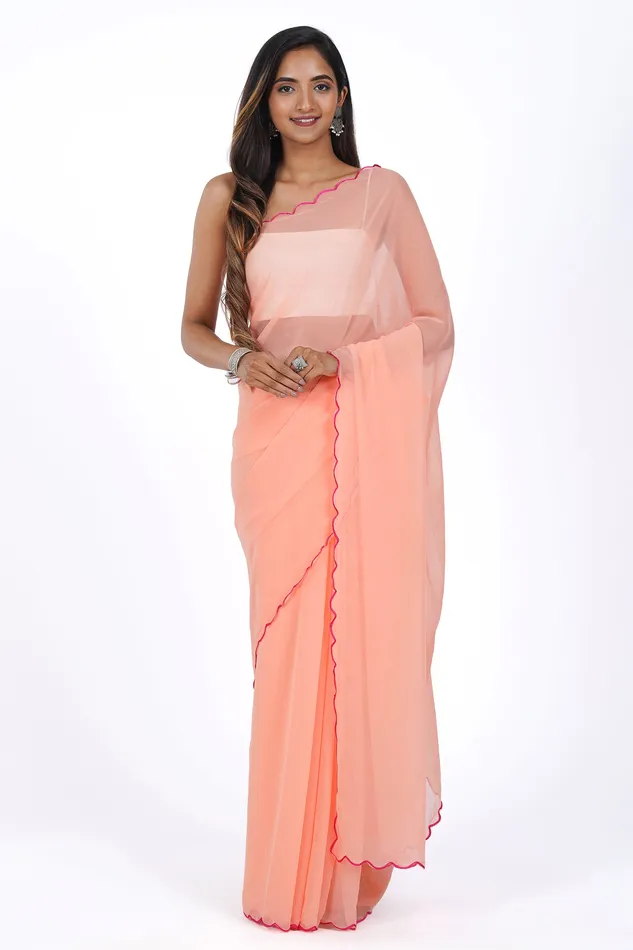 Teejh Apricot Aura Georgette Saree Teejh Earrings