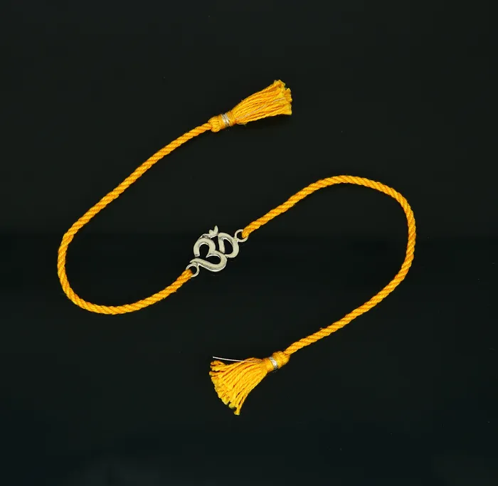 925 sterling silver custom design OM AUM design Rakhi bracelet with stunning yellow thread Best sibling rakhi for Festival Rakshabandhan rk160 TRIBAL ORNAMENTS Bracelets