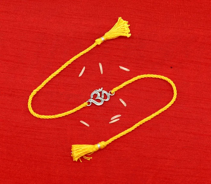 925 sterling silver custom design OM AUM design Rakhi bracelet with stunning yellow thread Best sibling rakhi for Festival Rakshabandhan rk160 TRIBAL ORNAMENTS Bracelets