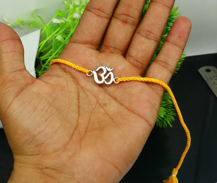 925 sterling silver custom design OM AUM design Rakhi bracelet with stunning yellow thread Best sibling rakhi for Festival Rakshabandhan rk160 TRIBAL ORNAMENTS Bracelets