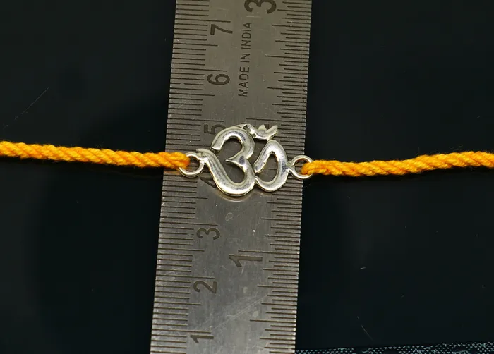 925 sterling silver custom design OM AUM design Rakhi bracelet with stunning yellow thread Best sibling rakhi for Festival Rakshabandhan rk160 TRIBAL ORNAMENTS Bracelets