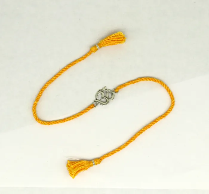 925 sterling silver custom design OM AUM design Rakhi bracelet with stunning yellow thread Best sibling rakhi for Festival Rakshabandhan rk160 TRIBAL ORNAMENTS Bracelets