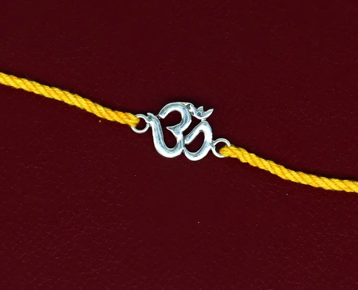 925 sterling silver custom design OM AUM design Rakhi bracelet with stunning yellow thread Best sibling rakhi for Festival Rakshabandhan rk160 TRIBAL ORNAMENTS Bracelets