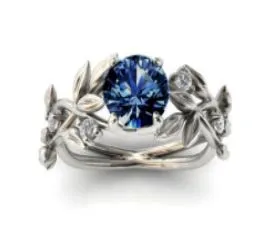 R353 Silver Vine Leaf Blue Gem Ring 01 Rings